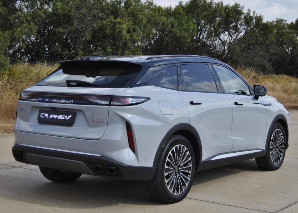 C9’s rear visual difference from the regular petrol is the PHEV badge on the tailgate and the secondary charging flap on the rear wing.