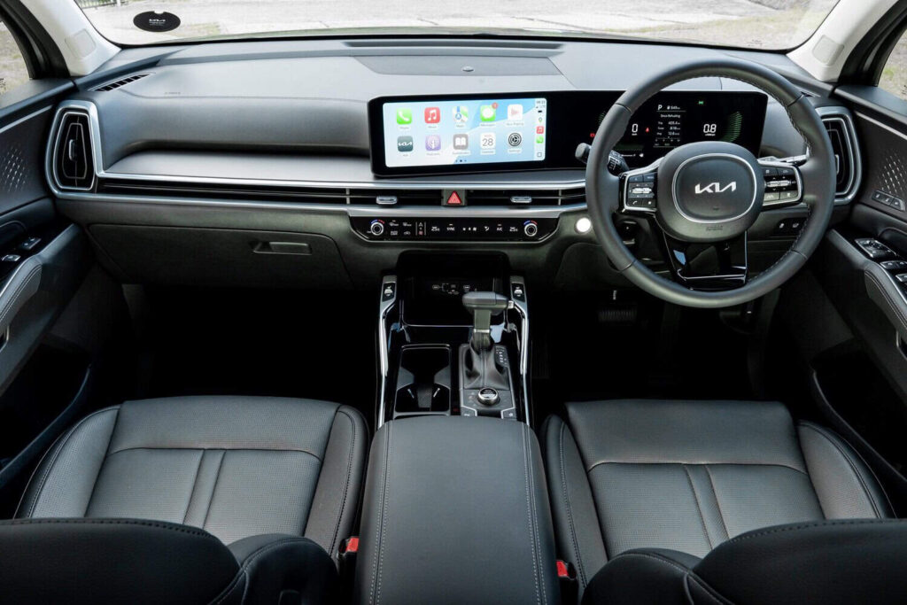 Interior has been uplifted with new materials, plus a pair of 12.3-inch displays across all models. Image: Kia