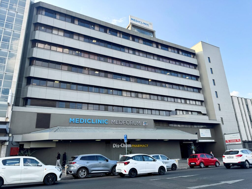 Cars are parked outside Mediclinic Medforum, where former Zambian President Edgar Lungu died while receiving specialized treatment, according to a statement by his political party, the Patriotic Front, on social media, in Pretoria, South Africa, June 5, 2025. REUTERS/Siyabonga Sishi