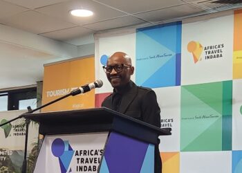 Oupa Pilane, Chairperson of the Southern Africa Tourism Services Association, speaking at a South African tourism event in Durban.
