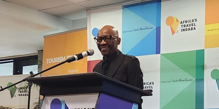 Oupa Pilane, Chairperson of the Southern Africa Tourism Services Association, speaking at a South African tourism event in Durban.