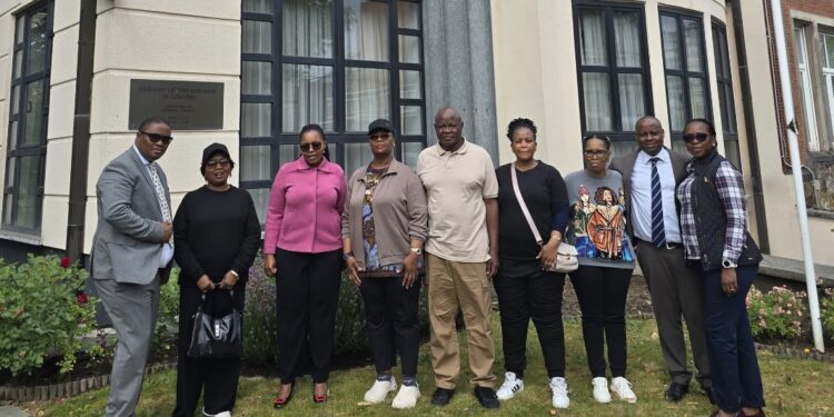 Lesotho and South African officials with embassy staff during a benchmarking visit at the Lesotho Embassy in Brussels.