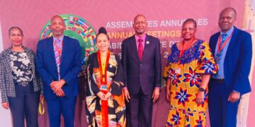 SADC Executive Secretary Elias M. Magosi (centre) with AfDB Executive Directors and senior officials during a strategic meeting to accelerate infrastructure development across Southern Africa.