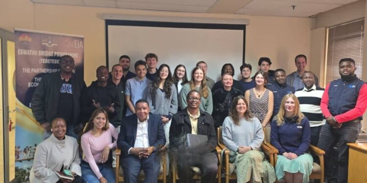 Under Secretary Siboniso Masilela and Microprojects Director Sibusiso Mbingo welcome 14 engineering students from the United States who will spend eight weeks in Hosea constructing the Nyakuza Footbridge, a project connecting three rural communities.