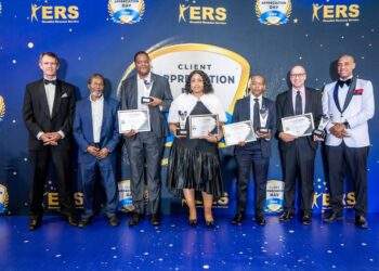 Eswatini Revenue Service Tax Commissioner and Minister of Finance, Neal Rijkenberg, pose with award recipients during the 2024 Client Appreciation Day group photo.