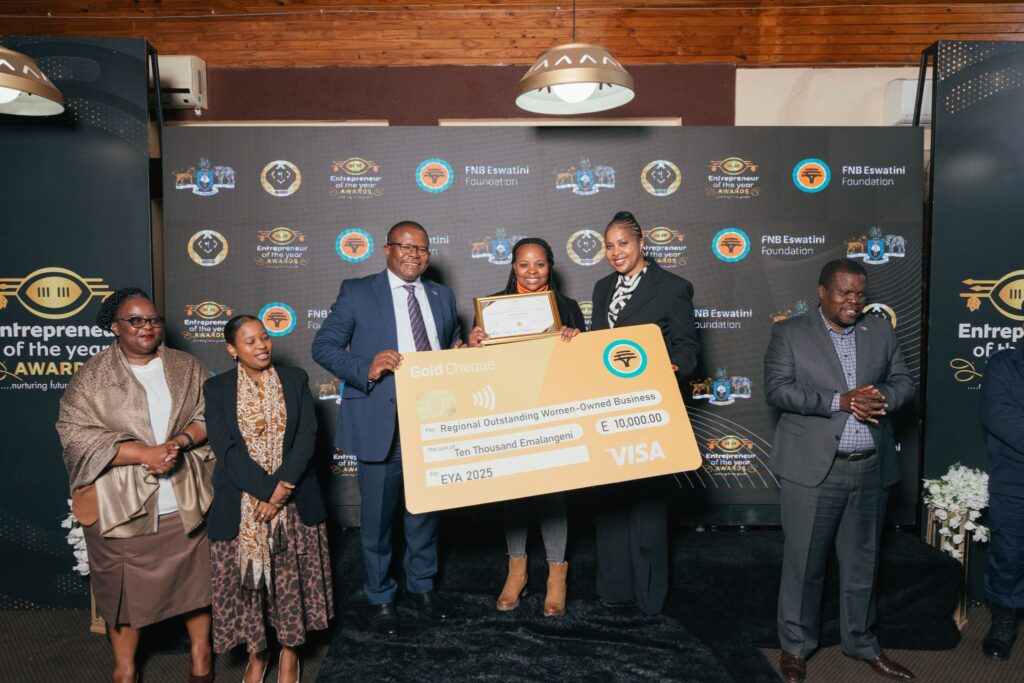 One of the award-winning entrepreneurs receives a certificate of recognition during the EYA 2025 Shiselweni regional awards in Nhlangano. Photo: SEDCO