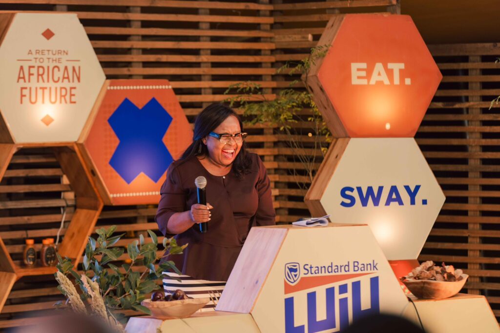 Minister of Tourism and Environmental Affairs Jane Mkhonta-Simelane addressing guests at the Luju Festival launch, with a focus on promoting cultural tourism and community development.
