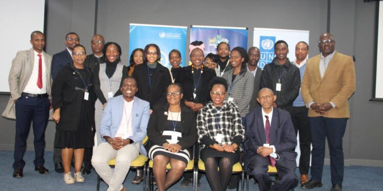 Participants pose for a group photo during the consultative meeting on Eswatini’s Universal Periodic Review implementation held in Mbabane.
