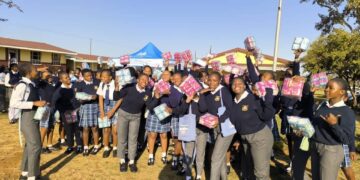 Girls from a school in Manzini Region collect sanitary pads during the distribution led by SOS Children’s Villages Eswatini.