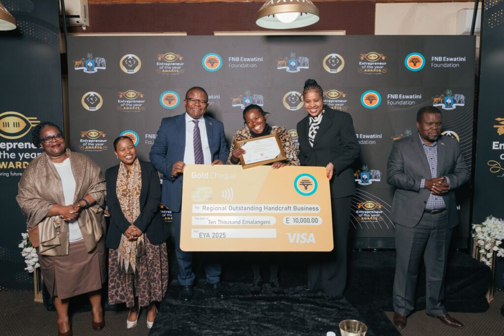 One of the award-winning entrepreneurs receives a certificate of recognition during the EYA 2025 Shiselweni regional awards in Nhlangano. Photo: SEDCO