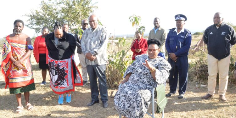 Deputy Prime Minister Thulisile Dladla shares a conversation with Sehlephi Nkambule and her grandchildren during a home visit in Ngwane Park.