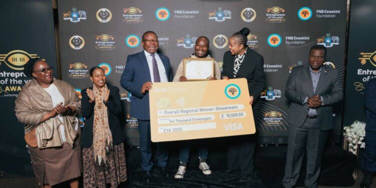 Selina Auto Spares representative receives the Regional Winner award from Minister of Commerce, Industry and Trade Manqoba Khumalo, joined by SEDCO officials and event sponsors at the Shiselweni Entrepreneur of the Year Awards.