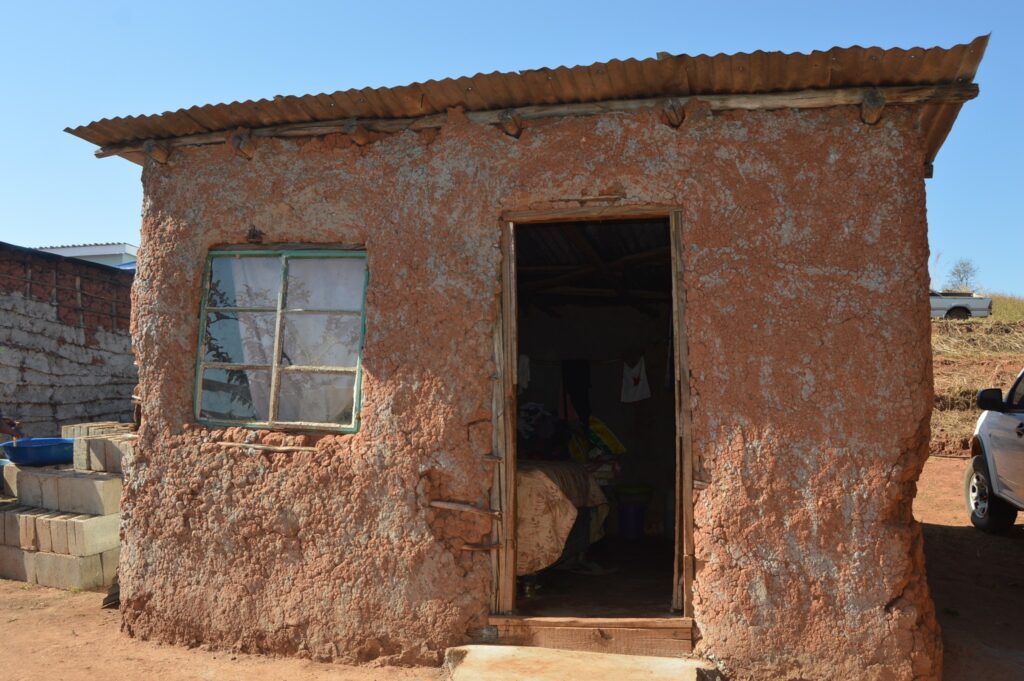 The old structure where Nkosinathi Ngwenya previously lived before receiving the new home in Nsingweni.