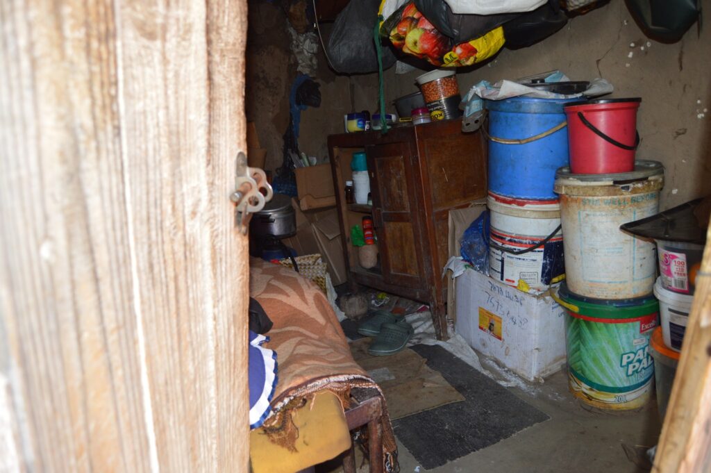 The Nkambule homestead, where Sehlephi lives with her four grandchildren, shows signs of wear with ageing walls, limited space, and no secure fencing.