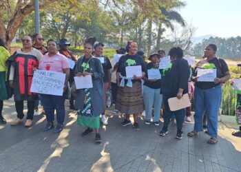 Members of the Swaziland Rural Women's Assembly march in solidarity during a protest held on Friday, July 18, 2025,