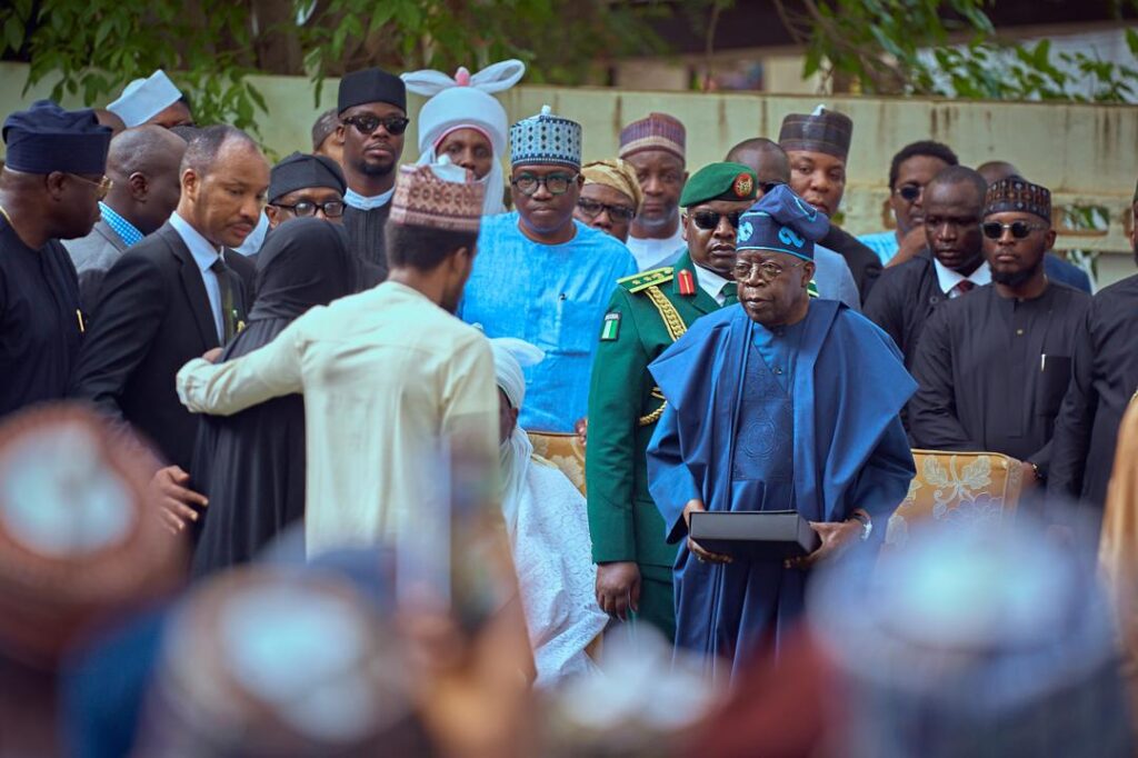 Nigerian President Bola Tinubu receives the body of former President Muhammadu Buhari