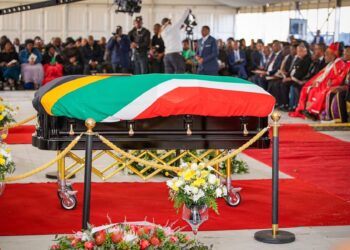 The casket of former Deputy President David Mabuza lies in state during the funeral service held in Mpumalanga.