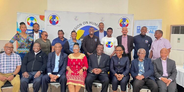 Participants and facilitators of the CHRPA induction programme gather for a group photo after the final session in Mbabane on Friday.