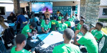 Ubombo Sugar FC players seated during the official rebranding and kit unveiling ceremony held in Big Bend.