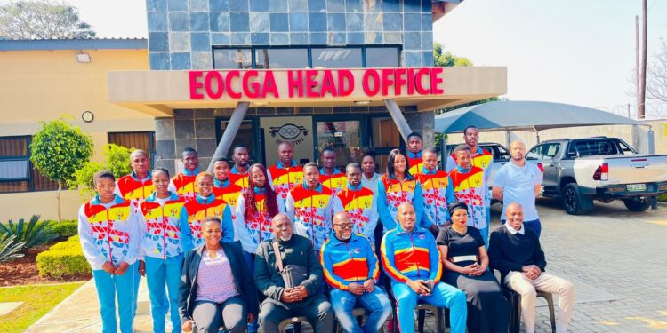 Team Eswatini athletes and officials pose for a group photo at the EOCGA offices before departing for international competitions.