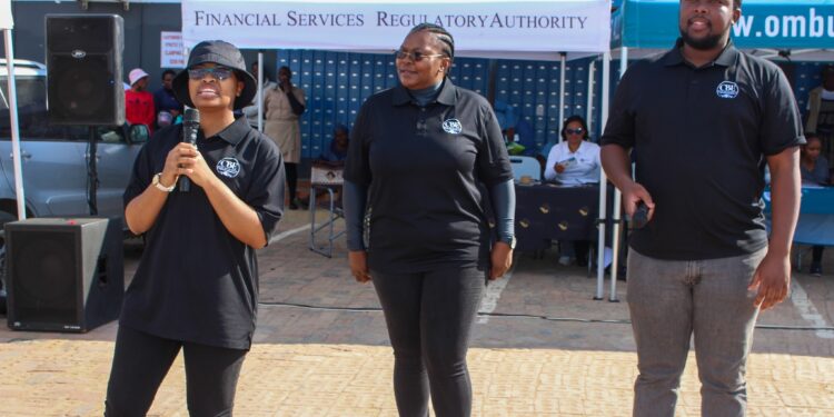 Officials from the Central Bank of Eswatini, FSRA, ECC, and the Ombudsman of Financial Services engage with Siphofaneni residents during a financial education outreach on July 24, 2025.