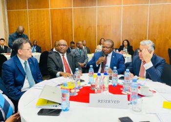 Minister of Commerce, Industry and Trade Manqoba Khumalo (centre) speaks during the Taiwan-Eswatini Investment Workshop in Ezulwini, flanked by Central Bank Governor Dr. Phil Mnisi (left) and Taiwan Ambassador H.E. Jeremy Liang (right).