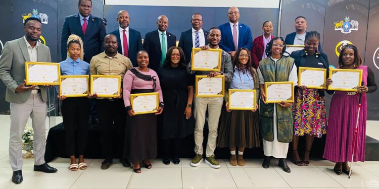 Minister of Commerce, Industry and Trade Manqoba Khumalo, SEDCO CEO, FNB CEO, and the regional EYA award winners