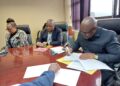 Government officials during the signing ceremony. (Courtesy pics)