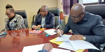 Government officials during the signing ceremony. (Courtesy pics)