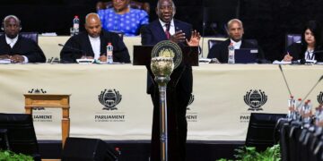 South African President Cyril Ramaphosa answers lawmakers' questions at the parliament in Cape Town, South Africa, March 11, 2025. REUTERS/Esa Alexander/File photo