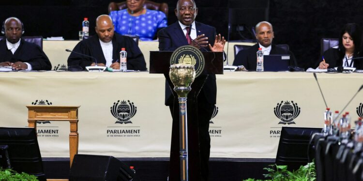 South African President Cyril Ramaphosa answers lawmakers' questions at the parliament in Cape Town, South Africa, March 11, 2025. REUTERS/Esa Alexander/File photo