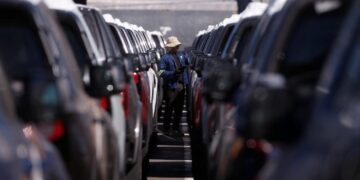 Vehicles awaiting export are scanned at the dock of the car terminal at the port of Durban, South Africa, April 10, 2025. REUTERS/Rogan Ward