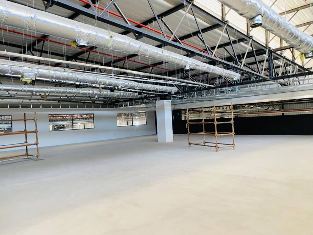 Minister Manqoba Khumalo inspects progress at the Jonnson Workwear factory site in Nhlangano ahead of its expected August handover.