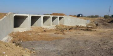 The nearly completed low-level bridge at Malibeni, set to improve safe access for residents, students, and healthcare services.