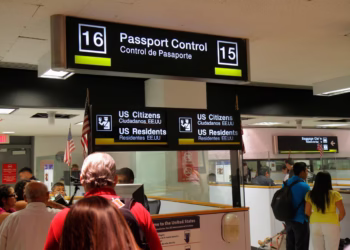 Arriving assengers enter passport control at Miami International Airport. Jeff Greenberg/Universal Images Group via Getty Images