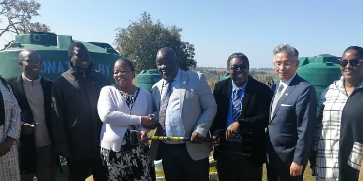 Minister of Education Owen Nxumalo, Taiwan Ambassador Jeremy Liam handing over the garden tools to the schools headteachers and during the event. (Pics: Sithembiso Sihlongonyane)