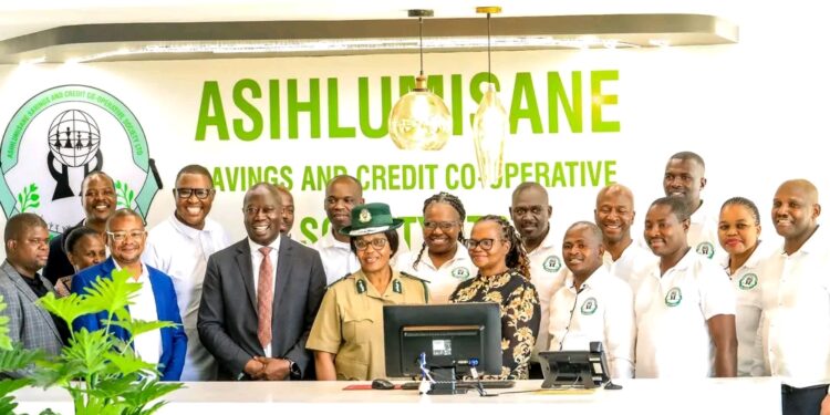 HMCS Commissioner General LaMakhosini Phindile Dlamini, Hluma Executive Board members, and government officials at the hand-over of the refurbished Asihlumisane banking hall in Matsapha.