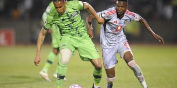 An Orlando Pirates player challenges a Marumo Gallants opponent during their Betway Premiership match at Dr Molemela Stadium on Tuesday night.