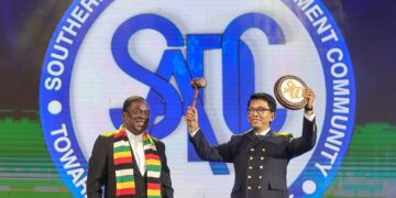 President Andry Rajoelina of Madagascar receives the SADC chairmanship from President Emmerson Mnangagwa of Zimbabwe at the 45th Summit in Antananarivo.