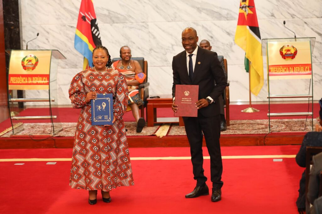 Eswatini and Mozambique foreign affairs officials exchange documents following the signing of key agreements to enhance regional collaboration.
