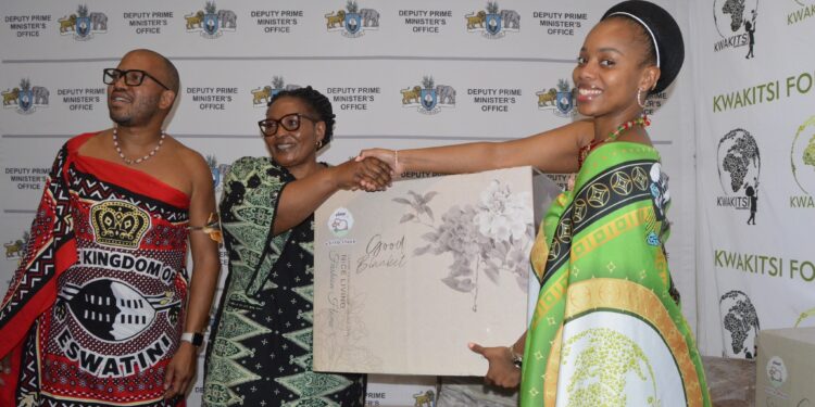 Deputy Prime Minister Thulisile Dladla receives a donation of blankets from Her Royal Highness Princess Temtsimba on behalf of the Kwakitsi Foundation at the DPM’s Office in Mbabane.