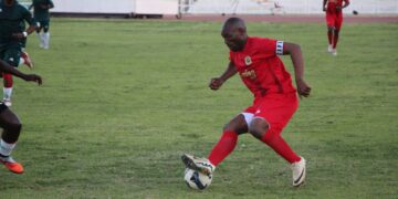 HMCS' Sabelo Skhali Ndzinisa showing some skill during the game.