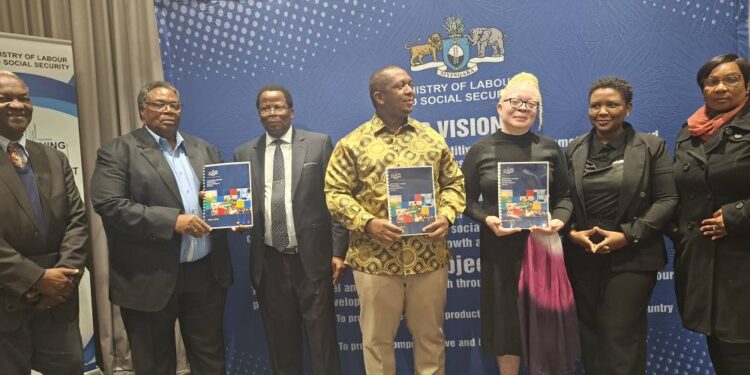 Minister Phila Buthelezi poses with stakeholders during the launch of the National Human Resource Development Policy on August 8, 2025.