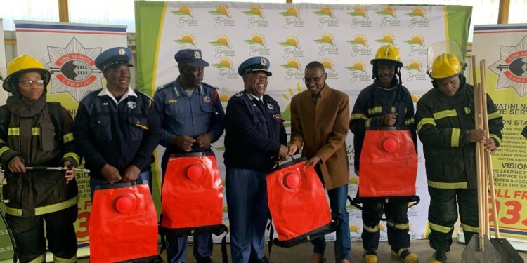 Officials from Ezulwini Town Council and the Eswatini National Fire and Rescue Service pose for a group photo during the handover of firefighting equipment at Lobamba Fire Station.