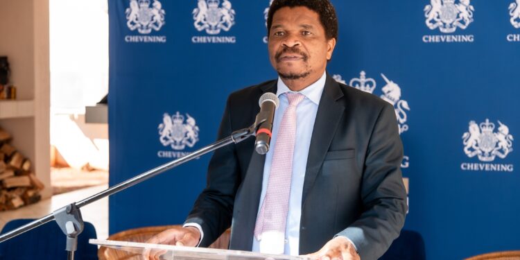 Mr. Andreas Dlamini delivering remarks on behalf of ICT Minister Hon. Savannah Maziya during the launch of the Chevening Alumni mentorship programme in Mbabane.