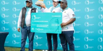 Michael Hollick celebrates his FNB Eswatini Challenge victory with caddie Clavie Taderera at Ezulwini Golf & Country Club.