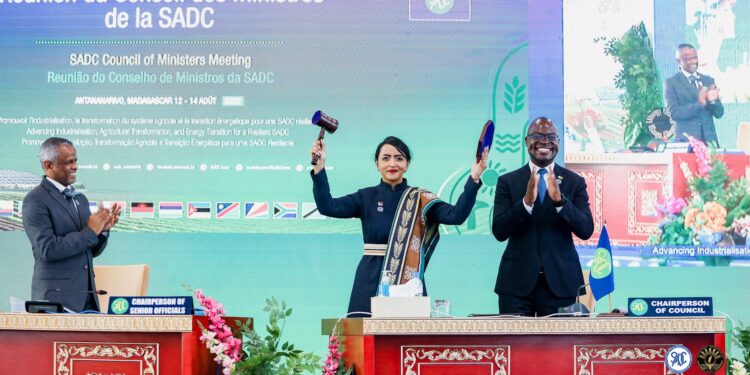 Madagascar’s Minister of Foreign Affairs, Dr Rafaravavitafika Rasata, receives the SADC Council of Ministers chairmanship from Zimbabwe’s Minister of International Relations and Trade, Professor Amon Murwira, during the opening of the Council meeting in Antananarivo.