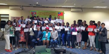 Health workers and facilitators pose for a group photo after completing the chronic disease care workshop in Mbabane.