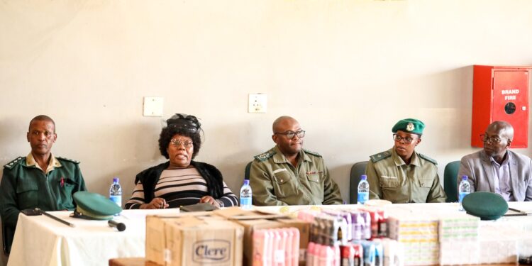HMCS Deputy Commissioner General Bongani Khumalo and Superintendent Nokuthula Maseko share a moment with Reverend Grace Masilela during the donation event.