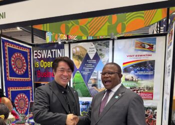 Minister Khumalo shakes hands with a private investor at Expo 2025 in Osaka